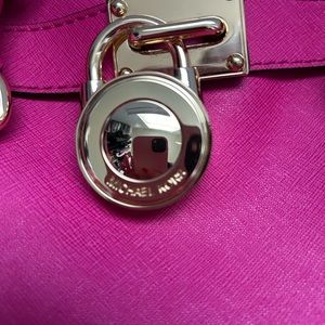 Michael Kors pink tote bag.